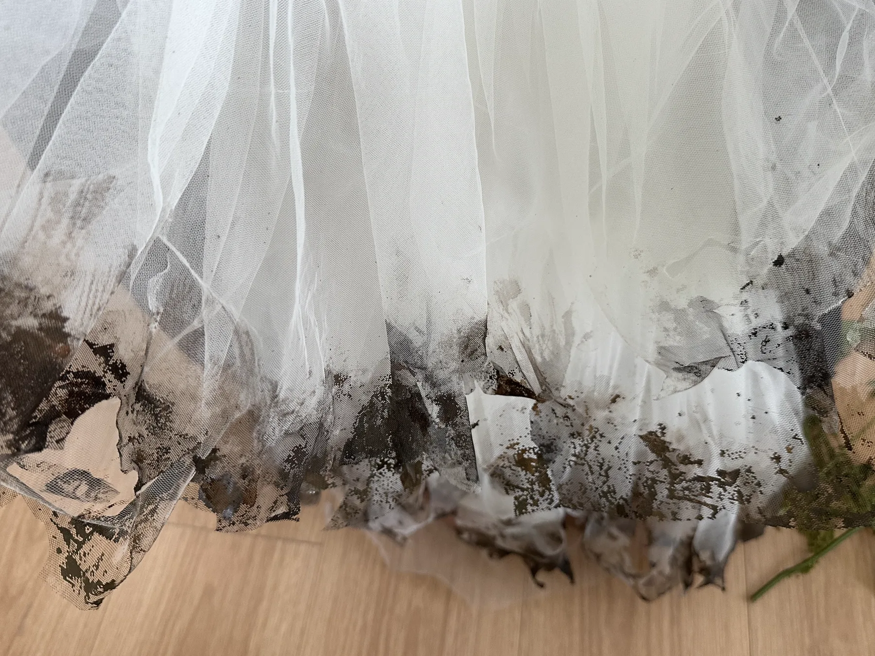 White translucent textile with an irregular black printed edge